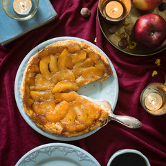 Classic french upside down apple tart Tarte Tatin. Selective focus.