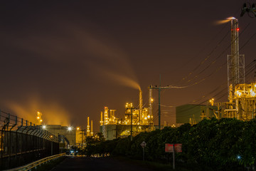 Fototapeta na wymiar beautiful lighting of oil refinery plant in petrochemical indust