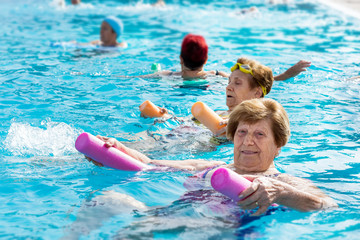 Senior female aqua gym session.