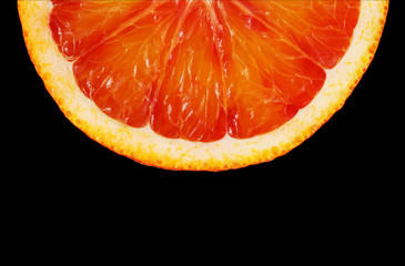 Slice red orange closeup on black background this clipping path.