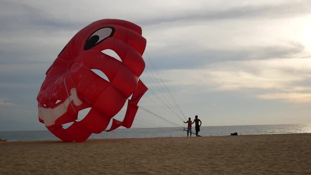 4K parasail on the beach with sunset background , Phuket , Thailand