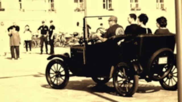 Driving a city street with a Ford model T 1921