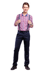 Fototapeta premium Full length studio portrait of handsome young man in plaid shirt with suspenders. Isolated on white.
