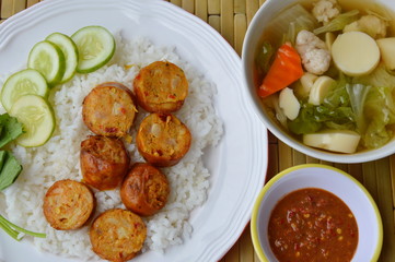 Thai tradition pork sausage and spicy shrimp paste with egg tofu soup