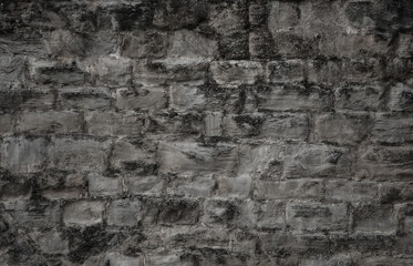 old dark cement wall in the gray color