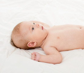 Beautiful happy baby. One, isolated on white.