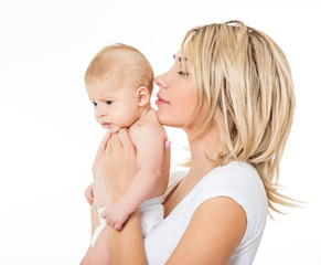 Mother and baby playing and smiling. Happy family.