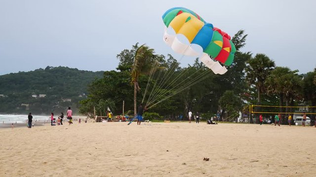 4K parasail on the beach with sunset background , Phuket , Thailand