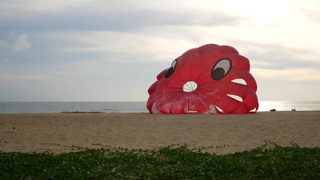4K parasail on the beach with sunset background , Phuket , Thailand