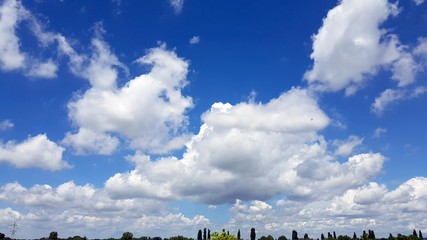 Beautiful Summer Blue Sky With White Scattered Soft Clouds