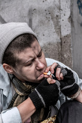 Homeless woman smoking
