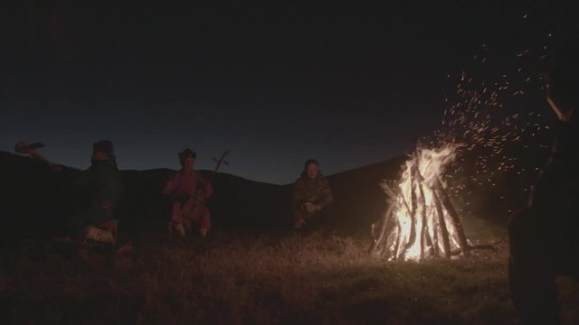 Musiciens au coin du feu