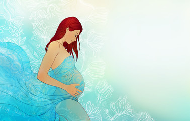 Portrait of a beautiful pregnant woman in flowers