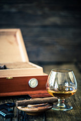 glass of cognac and cigar