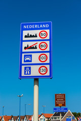 Welcome and national speed limits signs in Hoek van Holland, Netherlands. Hoek van Holland is a...