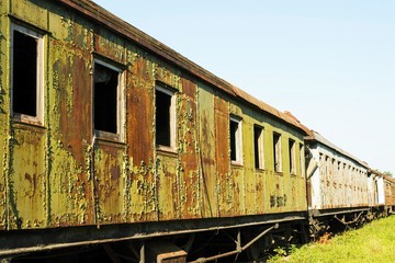 Obraz premium Old and rusted wagon trains at the train cemetery.