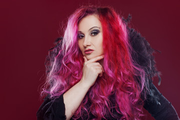 Attractive woman with pink hair. Royal collar. She suspects something