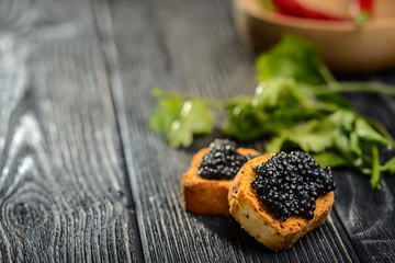 Bread and black caviar