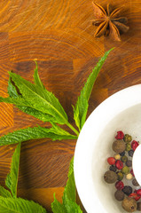 Fresh spearmint herb in the mortar