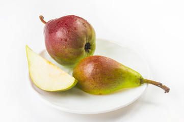 colorful pears in the dish