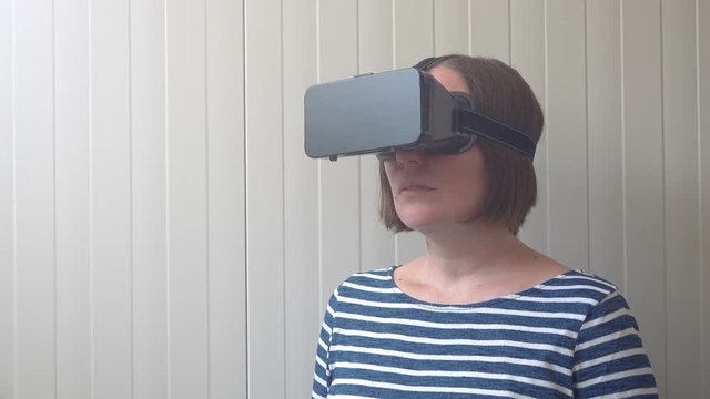 Virtual reality and 360 view video with woman using VR goggle headset