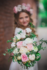 gentle pink bridal bouquet with tapes