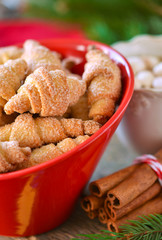Christmas cookies with sugar, cinnamon and nuts on New Year's