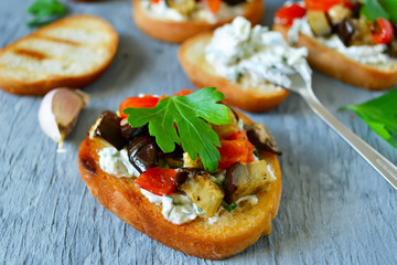 bruschetta with mascarpone, pepper and eggplant grilled