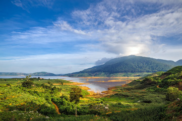 Fototapeta na wymiar DAKLAK- VIETNAM: landscape of Namka lake with mountain in highland Daklak province, Vietnam.
