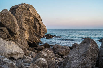 Fototapeta na wymiar Sea and rocks at sunset