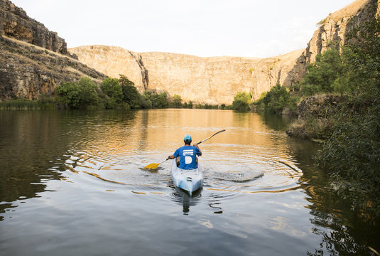 Spain, Segovia, Man in a canoe in Las Hoces del Rio Duraton