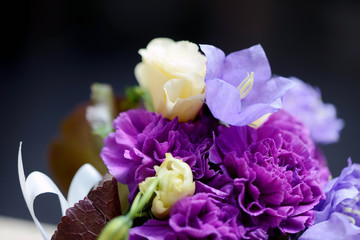 Beautiful wedding colorful bouquet for bride. Beauty of colored flowers. Close-up bunch of florets. Bridal accessories. Female decoration for girl. Details for marriage and for married couple