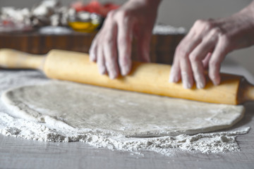 Rolling dough for calzone horizontal