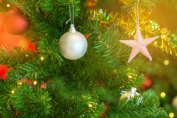 christmas tree decorations and blurred lights background. 
