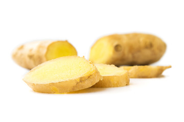 Fresh ginger on white background, raw material for cooking, sele