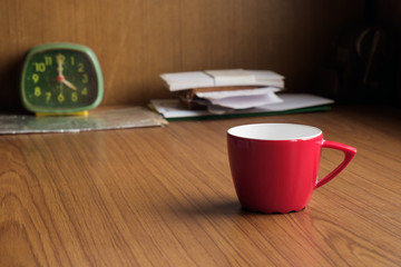 Red cup coffee / Empty red cup coffee on wood table.