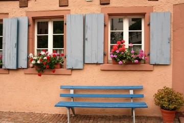 Fototapeta na wymiar two windows with a bench 