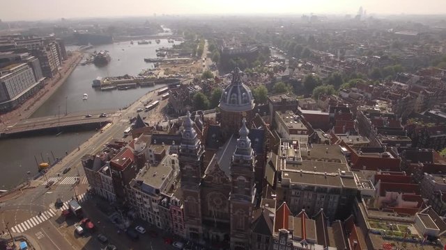 Aerial. The Basilica of Saint Nicholas. Old Centre district of Amsterdam. 4K