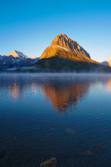 Fototapeta na wymiar Swiftcurrent Lake, Glacier National Park - Sun Rising
