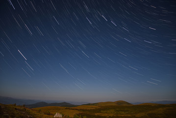 mountains star tracks sky