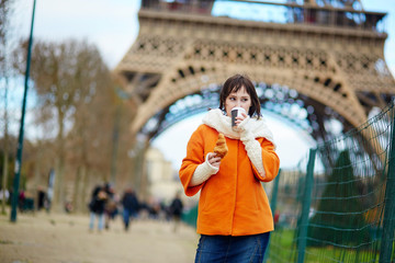 Cheerful young woman in Paris