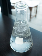 Lab flask with water and ice