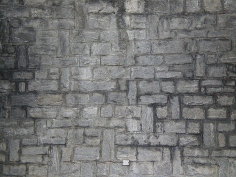 Close up of a manmade wall with rectangular stones