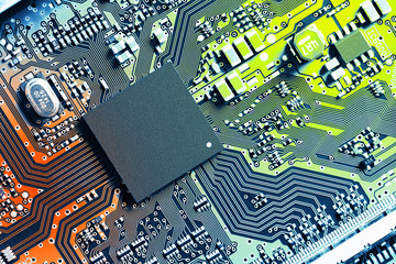 Electronic circuit board close up.