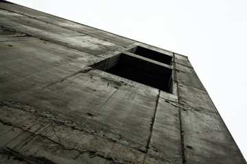 Concrete wall of the unfinished building