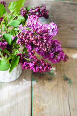 Lilac flowers in a rustic interior