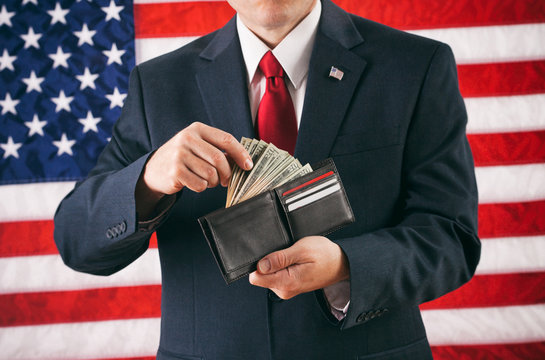 Politician: Man Making A Withdrawal From Cash Full Wallet