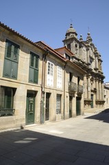 Obraz premium Street with traditional houses and the Bartholomew Church in Pontevedra, Spain