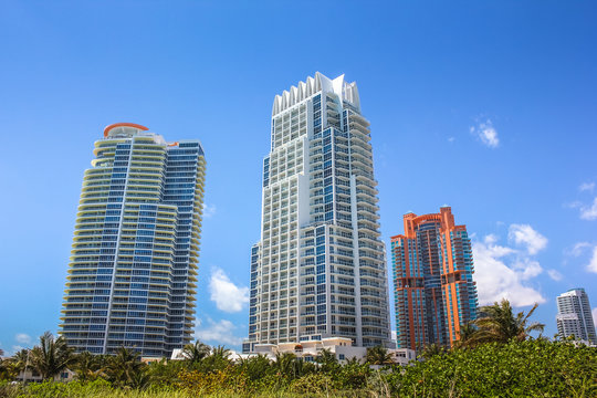Miami skyscrapers. Miami South Beach in Downtown District in sunny day. Apartment and business buildings in Miami Beach, Florida.