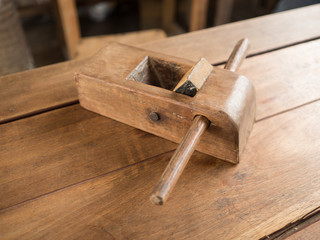 A small asian old plane for wood working.